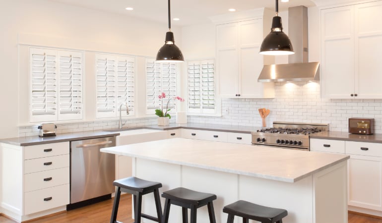 Plantation shutters in a bright Philadelphia kitchen.